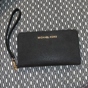 Michaels kors wristlet. Fits phone!
